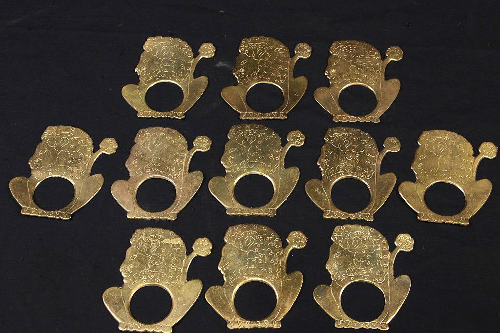 11 PIECE LION NAPKIN RINGS: 11 PIECE LION NAPKIN RINGS. Height: 4 in. by Width: 3 in.