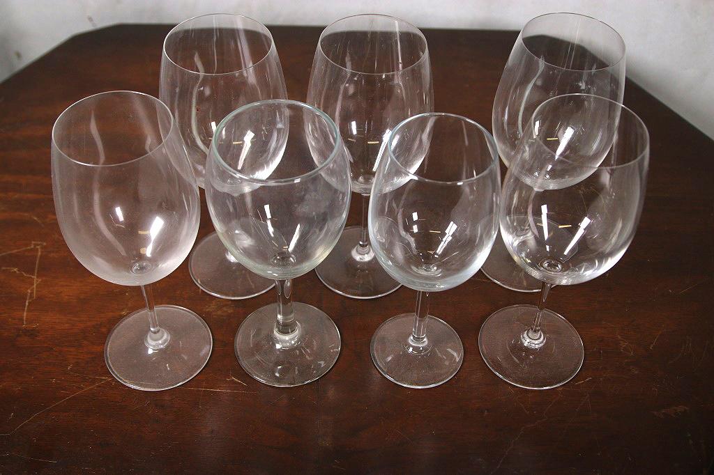 LOT OF SEVEN WHITE WINE GOBLETS: LOT OF SEVEN WHITE WINE GOBLETS. 9"H X 4"W.