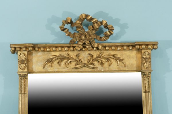 A HIGHLY CARVED AND GILTWOOD MIRROR, CIRCA 1830 - 2