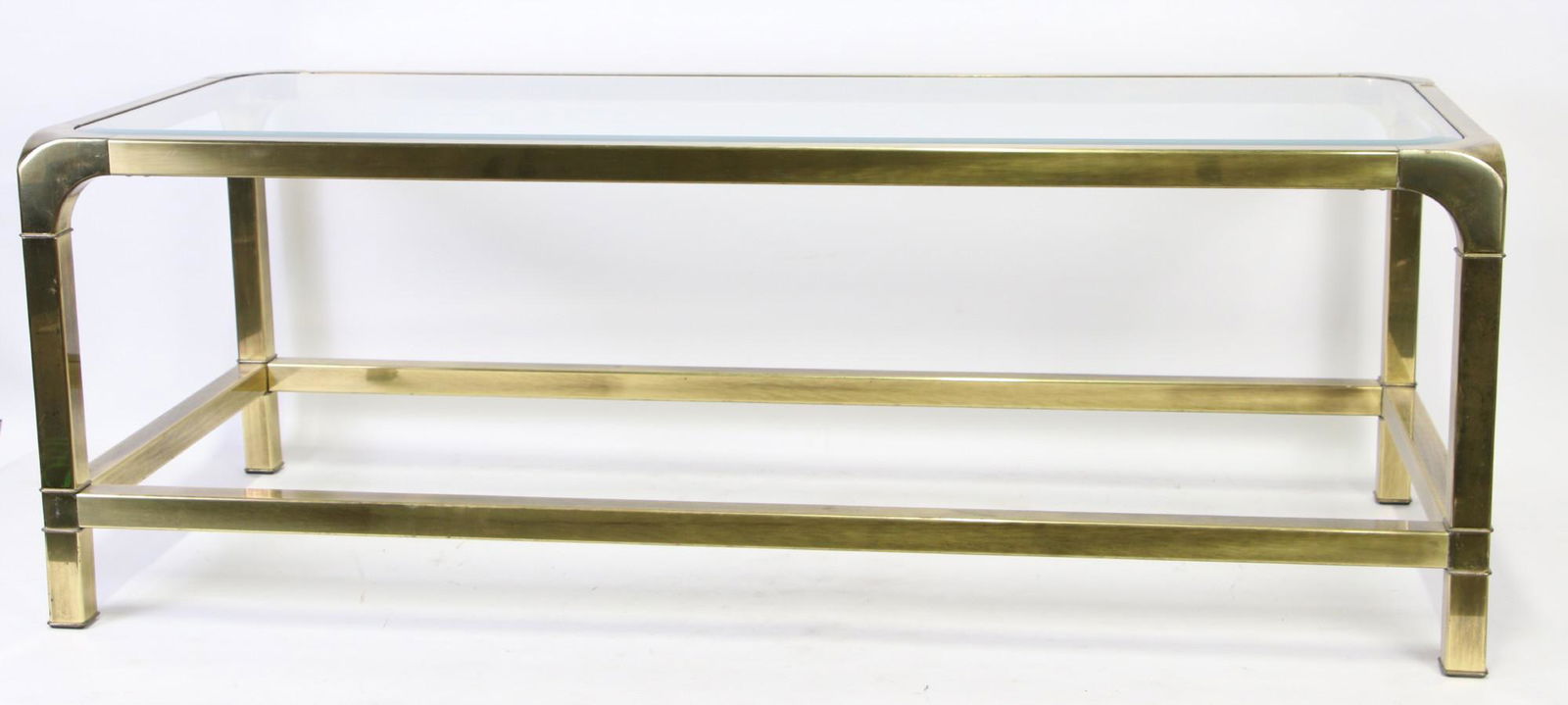 1970's METAL BASE GLASS TOP COFFEE TABLE: 1970's METAL BASE GLASS TOP COFFEE TABLE. Height: 17 in. by Width: 48 in. by Depth: 20 in.