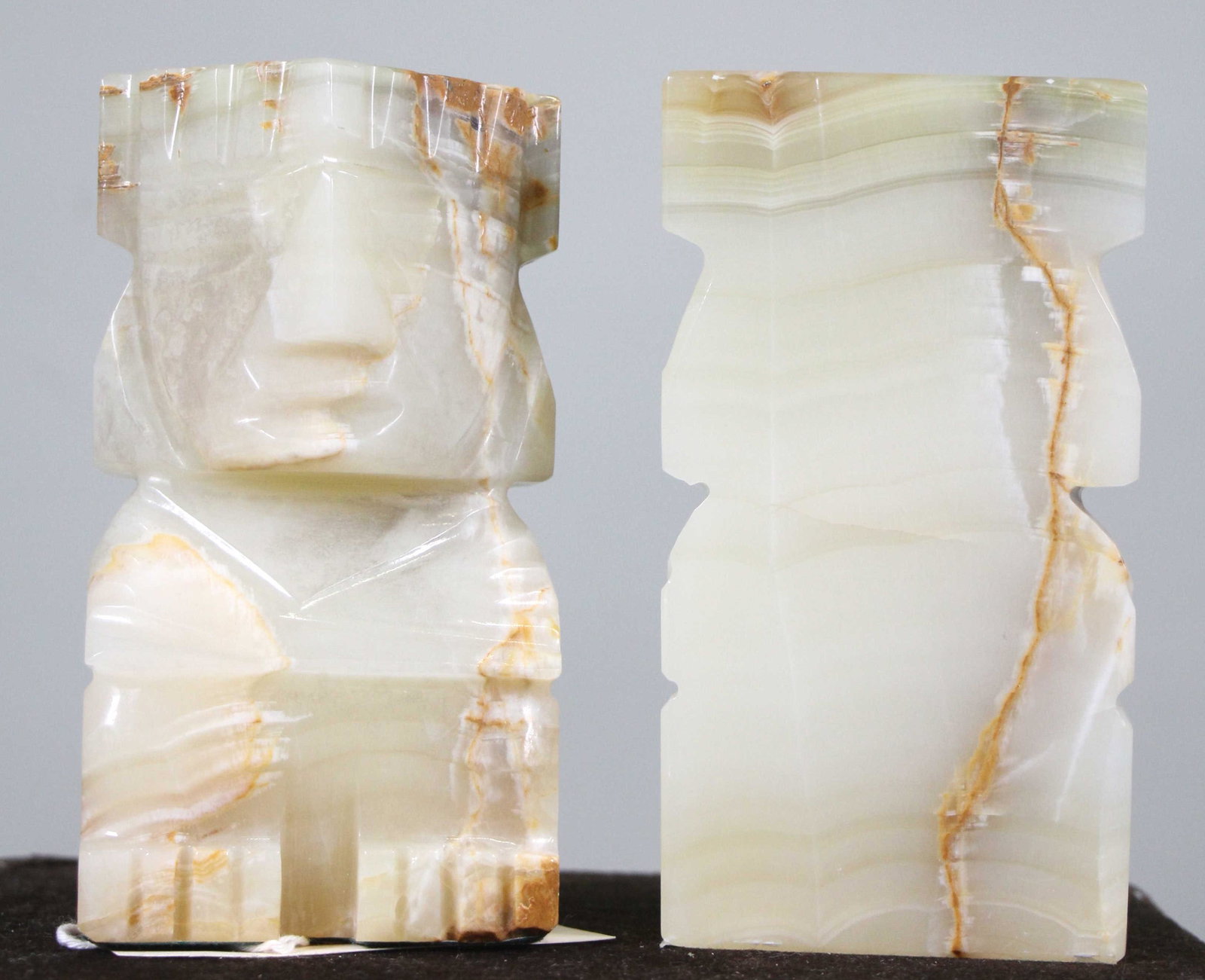 PAIR OF ONYX AZTEC BOOKENDS: PAIR OF ONYX AZTEC BOOKENDS - **FROM THE JOHN WALTON ESTATE** Height: 6 in. by Width: 4 in. by Depth: 2
