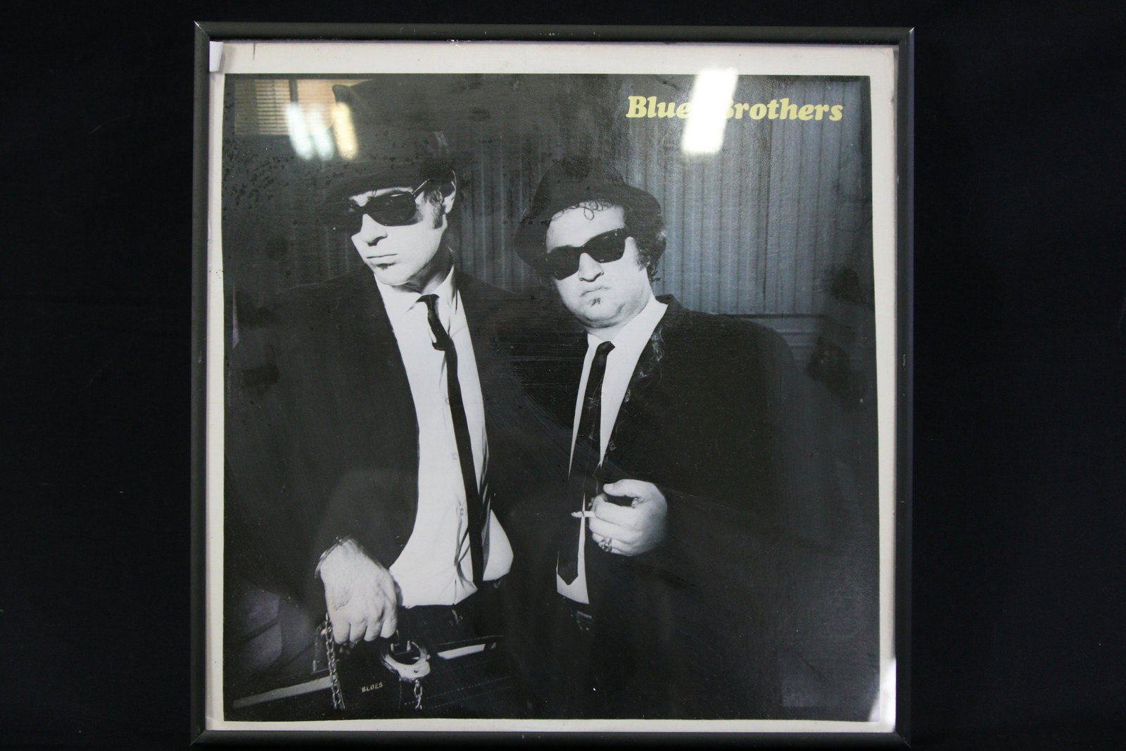 FRAMED "BLUES BROTHERS BRIEFCASE FULL OF BLUES" RECORD: FRAMED "BLUES BROTHERS BRIEFCASE FULL OF BLUES" LP RECORD - **FROM THE JOHN WALTON ESTATE** Height: 13 in. by Width: 13 in. by Depth: 1