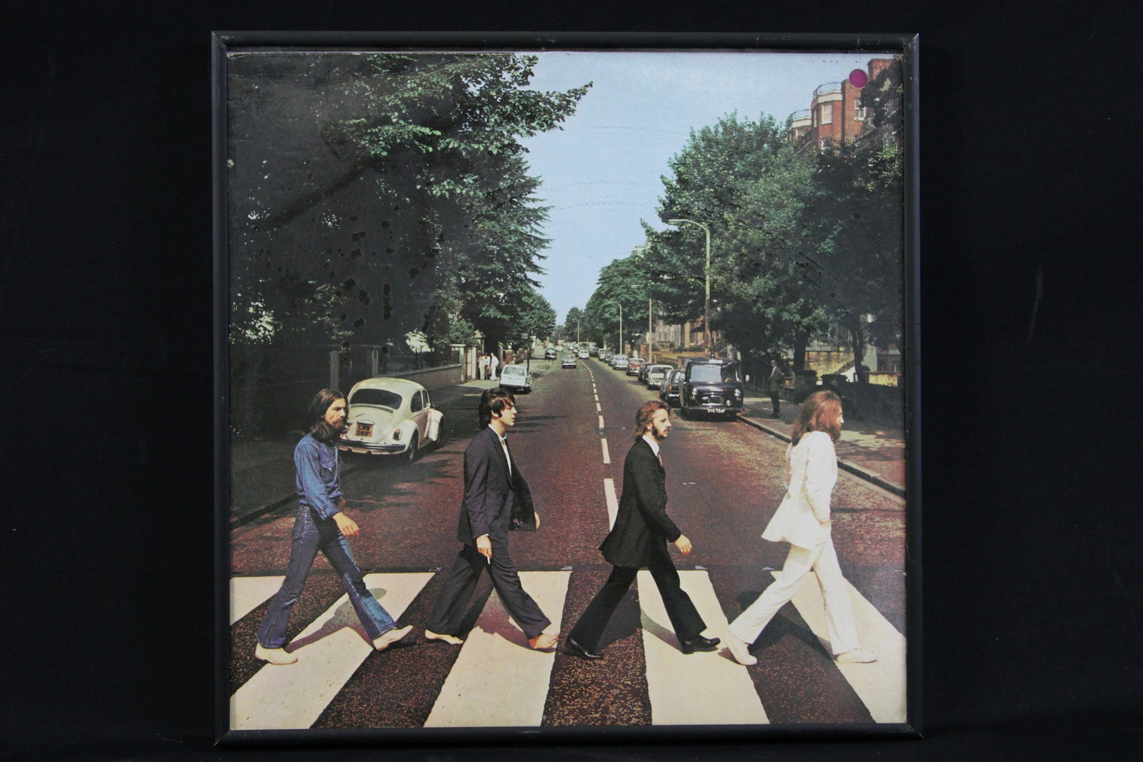 FRAMED "THE BEATLES - ABBEY ROAD" LP RECORD: FRAMED "THE BEATLES - ABBEY ROAD" LP RECORD - **FROM THE JOHN WALTON ESTATE** Height: 13 in. by Width: 13 in. by Depth: 1