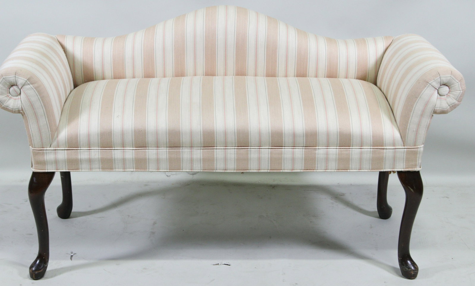 CAMEL BACK SETTEE: CAMEL BACK SETTEE. Height: 25 in. by Width: 50 in. by Depth: 18 IN .