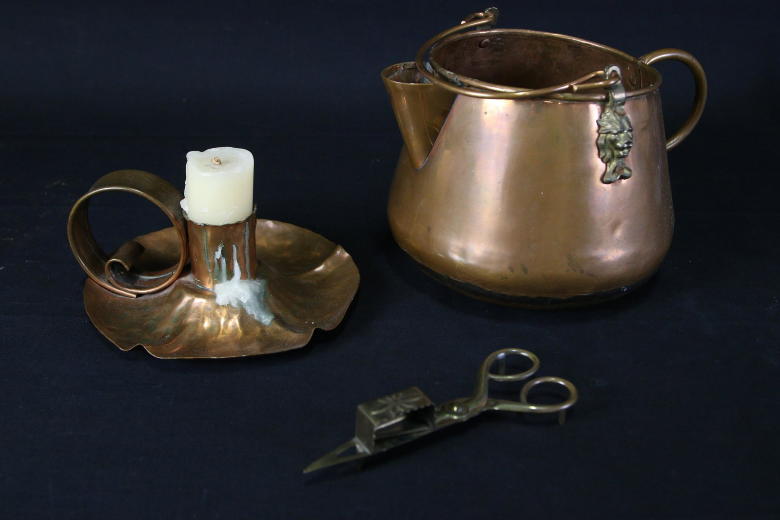 COPPER CANDLESTICK AND TEAPOT: COPPER CANDLESTICK AND TEAPOT. Height: 6 in. by Width: 10 in. by Depth: 7 IN .