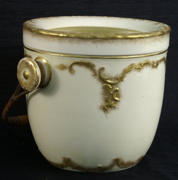 PORCELAIN COMMODE WITH GOLD TRIM AND HANDLE