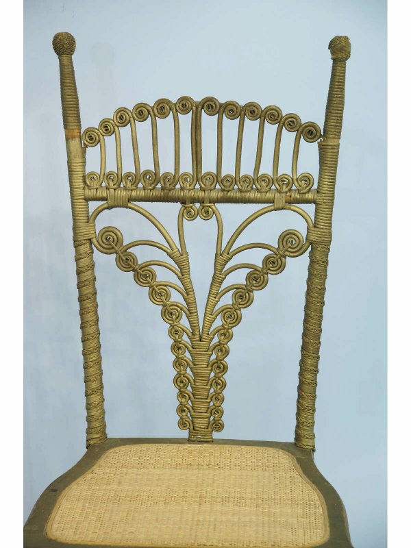 A GREEN WICKER CHAIR - 2