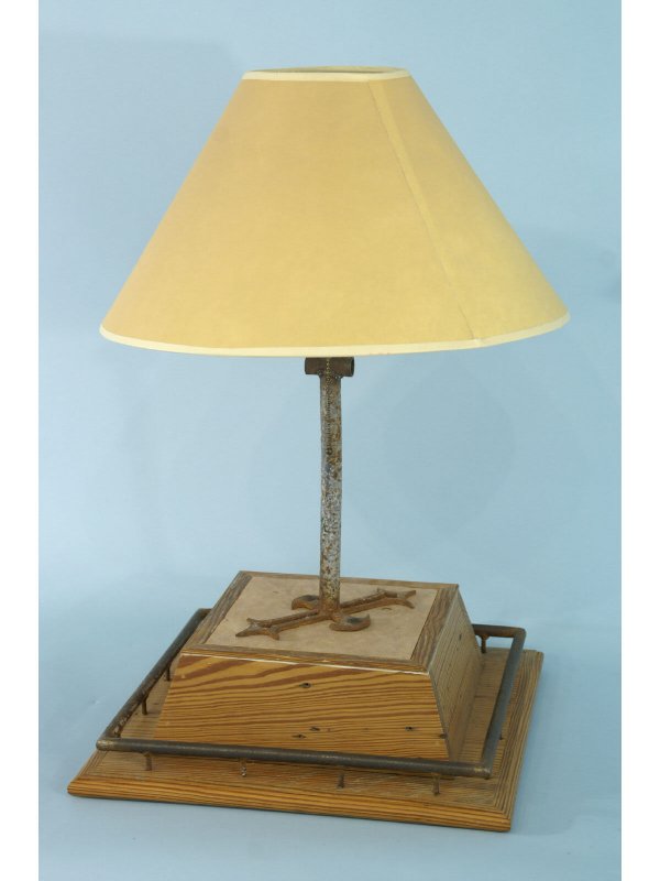 A WOODEN NAUTICAL LAMP