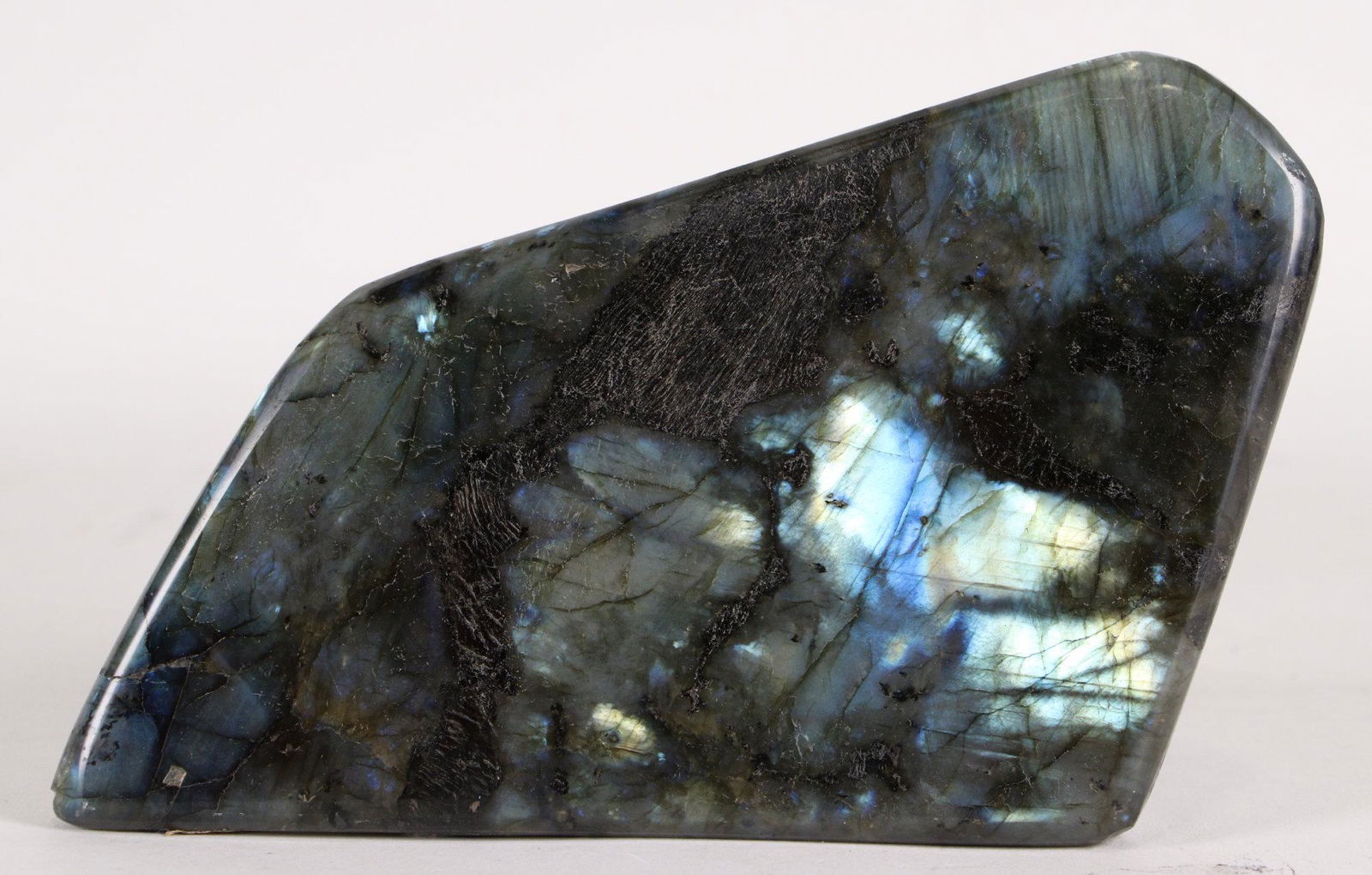 SMALL LABRADORITE SLICE: SMALL LABRADORITE SLICE WEIGHT 2.8LBS Height: 4 in. by Width: 7 in. by Depth: 2
