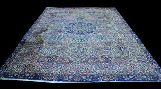 ANTIQUE KIRMAN RUG IN BLUES, VIOLETS & IVORY