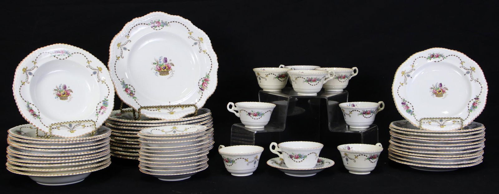 56-PIECE SET OF SPODE BONE CHINA DINNERWARE: 56-PIECE SET OF SPODE BONE CHINA DINNERWARE. INCLUDES 11 SOUP BOWLS, 9 TEA CUPS, 12 SAUCERS, 12 BREAD PLATES & 12 DINNER PLATES. Height: 1 1/2 in. by Width: 8 in. by Depth: 8 in.