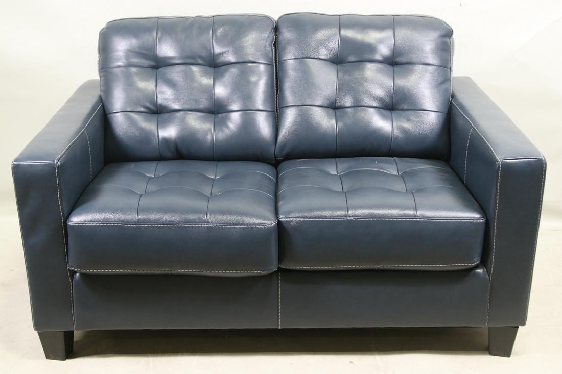 BLUE LEATHER LOVESEAT: BLUE LEATHER LOVESEAT Height: 36 in. by Width: 52 in. by Depth: 37