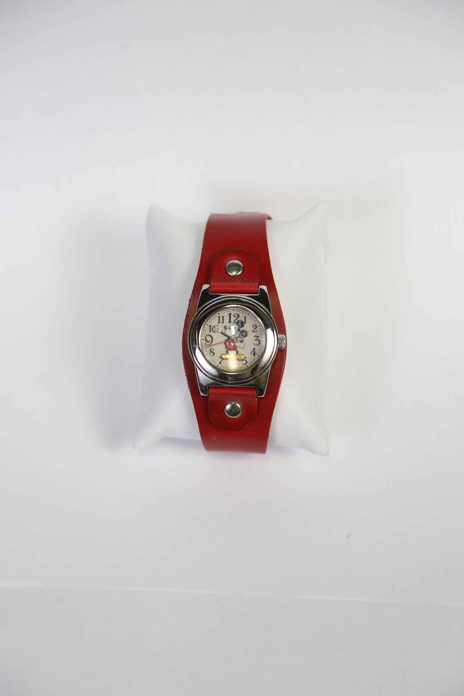 VINTAGE MICKEY MOUSE MANUAL Watch W/LEATHER BAND: MICKEY MOUSE MANUAL WATCH WITH ALL ORIGINAL PARTS & RED LEATHER BAND. WATCH IS IN WORKING CONDITION.
