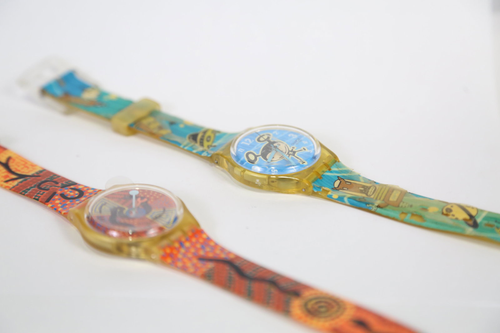 SET OF 2 SWatch WatchES â€“ LTD ED 2000 SYDNEY GAMES: SET OF 2 SWATCH WATCHES FROM THE 2000 SYDNEY GAMES IN THEIR ORIGINAL PLASTIC CASES.