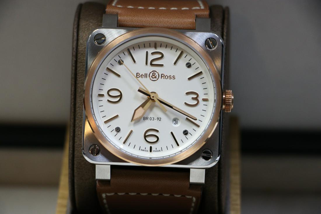 Bell & Ross Br03-92 Steel/Rose Gold 42mm Watch: Bell & Ross Br03-92 Steel/Rose Gold 42mm Watch•The Br 03-92 Steel & Rose Gold Watch By Bell & Ross. Paired With A Calf Leather Strap And Pin Clasp, This Watch Features An Automatic Movement With 