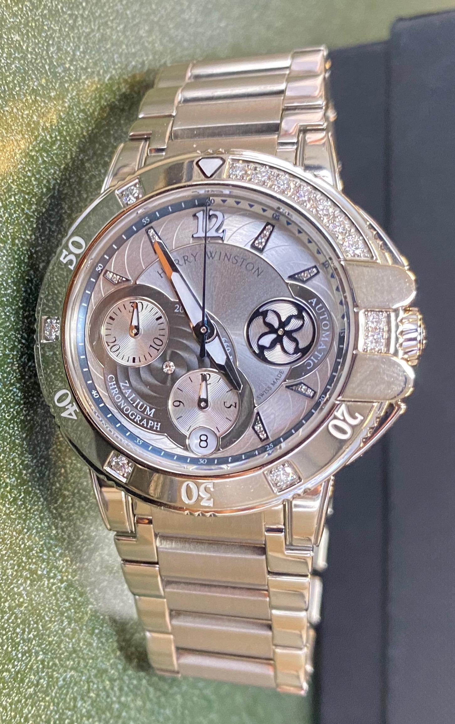 HARRY WINSTON 411/LCA38Z ZALIUM DIAMOND CHRONO Watch: Pre-Owned Harry Winston Ref 411/Lca38z Zalium & Diamonds Chronograph Watch â€“ Like New with all original paperwork and boxes.Made circa 2010. Very fine and unusual, self-winding, Watcher resista