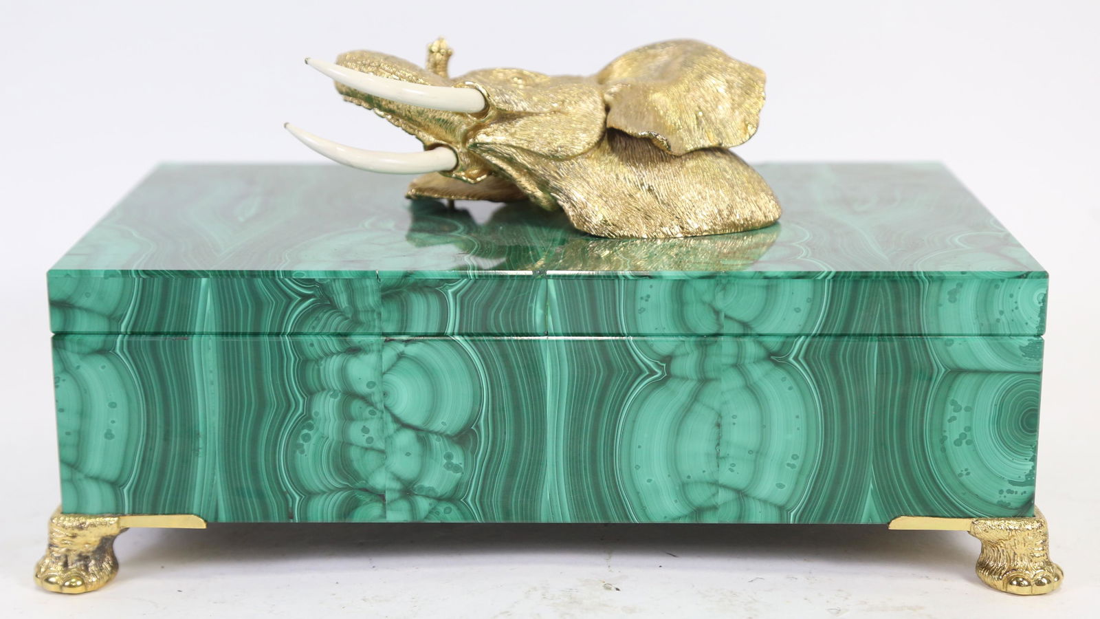 MALACHITE LIDDED BOX WITH GILT ELEPHANT HANDLE: MALACHITE LIDDED BOX WITH GILT ELEPHANT HANDLE. RESTORRED TOP. Height: 6 in. by Width: 11.5 in. by Depth: 7.5