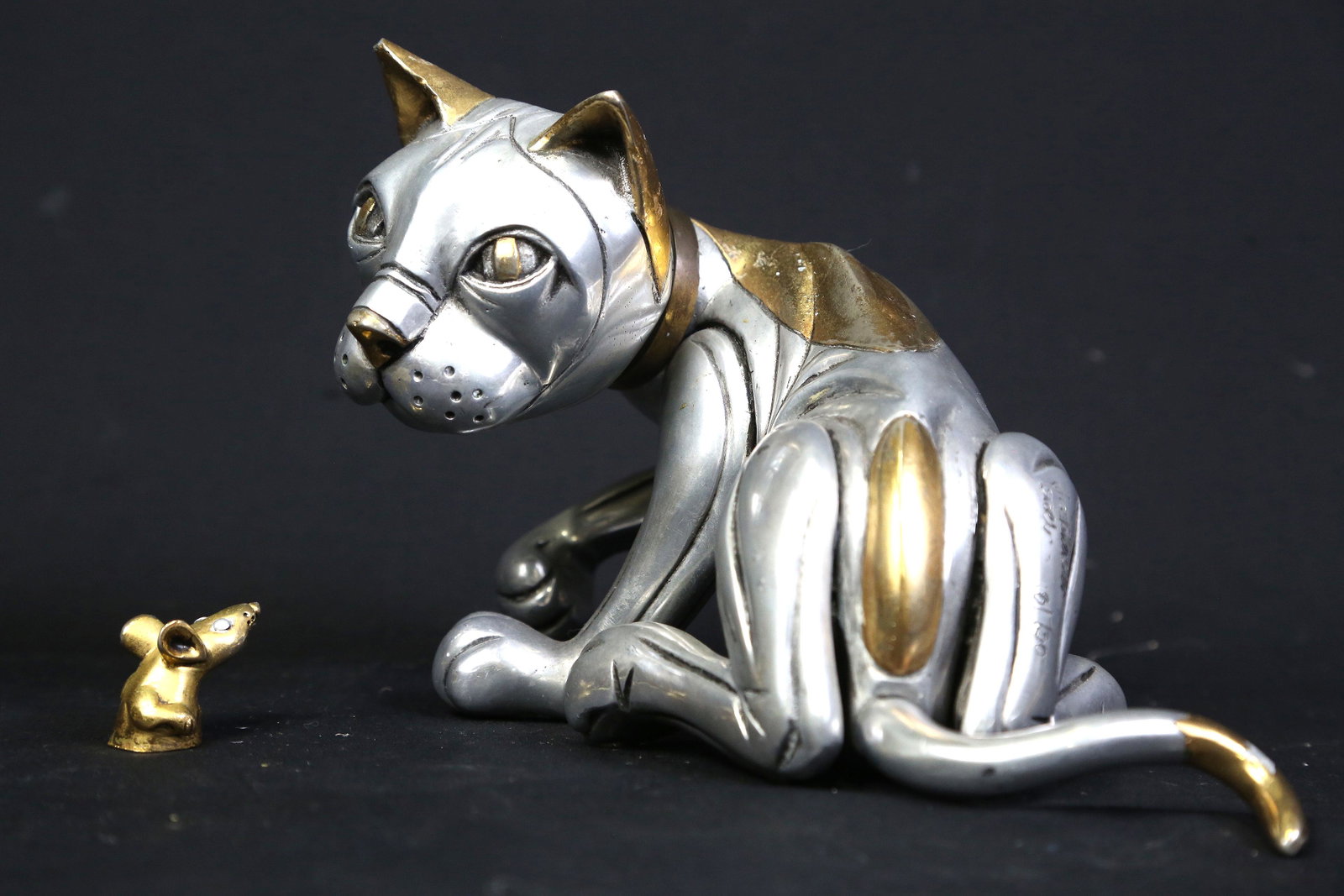 FRANK MEISLER METAL CAT & MOUSE: FRANK MEISLER METAL ARTICULATING CAT & MOUSE, EDITION NUMBER 18/730. Height: 6 in. by Width: 9 in. by Depth: 7.5