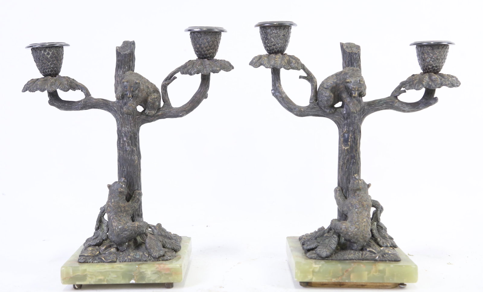 PAIR OF CIRCA 1900 BRONZE BEAR CANDLESTICKS: PAIR OF CIRCA 1900 GERMAN BRONZE BEAR CANDLESTICKS ON ONYX BASE. Height: 11.5 in. by Width: 5 in. by Depth: 5
