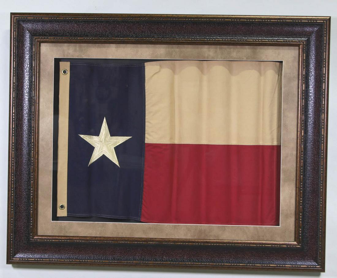 FRAMED WAVY TEXAS FLAG: FRAMED WAVY TEXAS FLAG EMBROIDERY ON CANVAS IN SHADOW BOX FRAME. Height: 39 by Width: 48