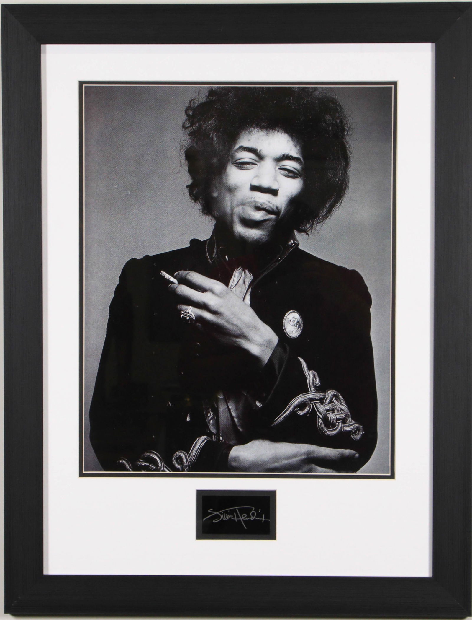 FRAMED JIMI HENDRIX PICTURE WITH AUTOGRAPH: FRAMED JIMI HENDRIX PICTURE WITH AUTOGRAPH. Height: 30 by Width: 23 1/2