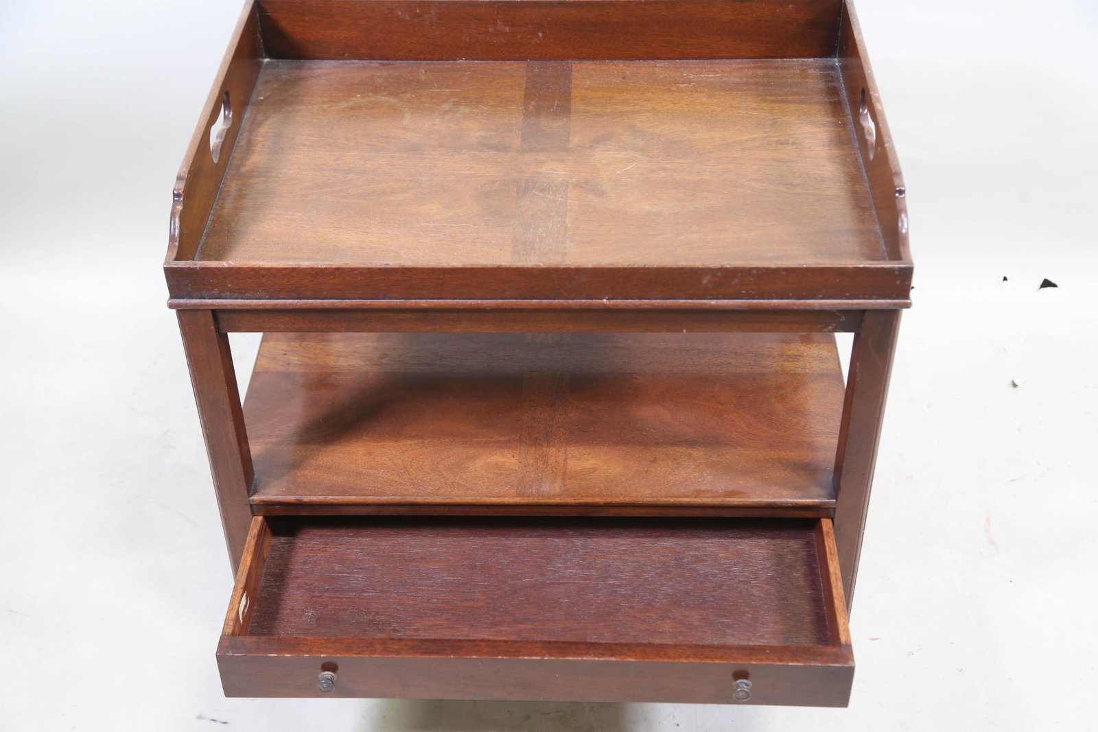 BUTLER'S MAHOGANY TRAY TABLE WITH DRAWER: BUTLER'S MAHOGANY TRAY TABLE WITH DRAWER BELOW. Height: 24 by Width: 26 by Depth: 18