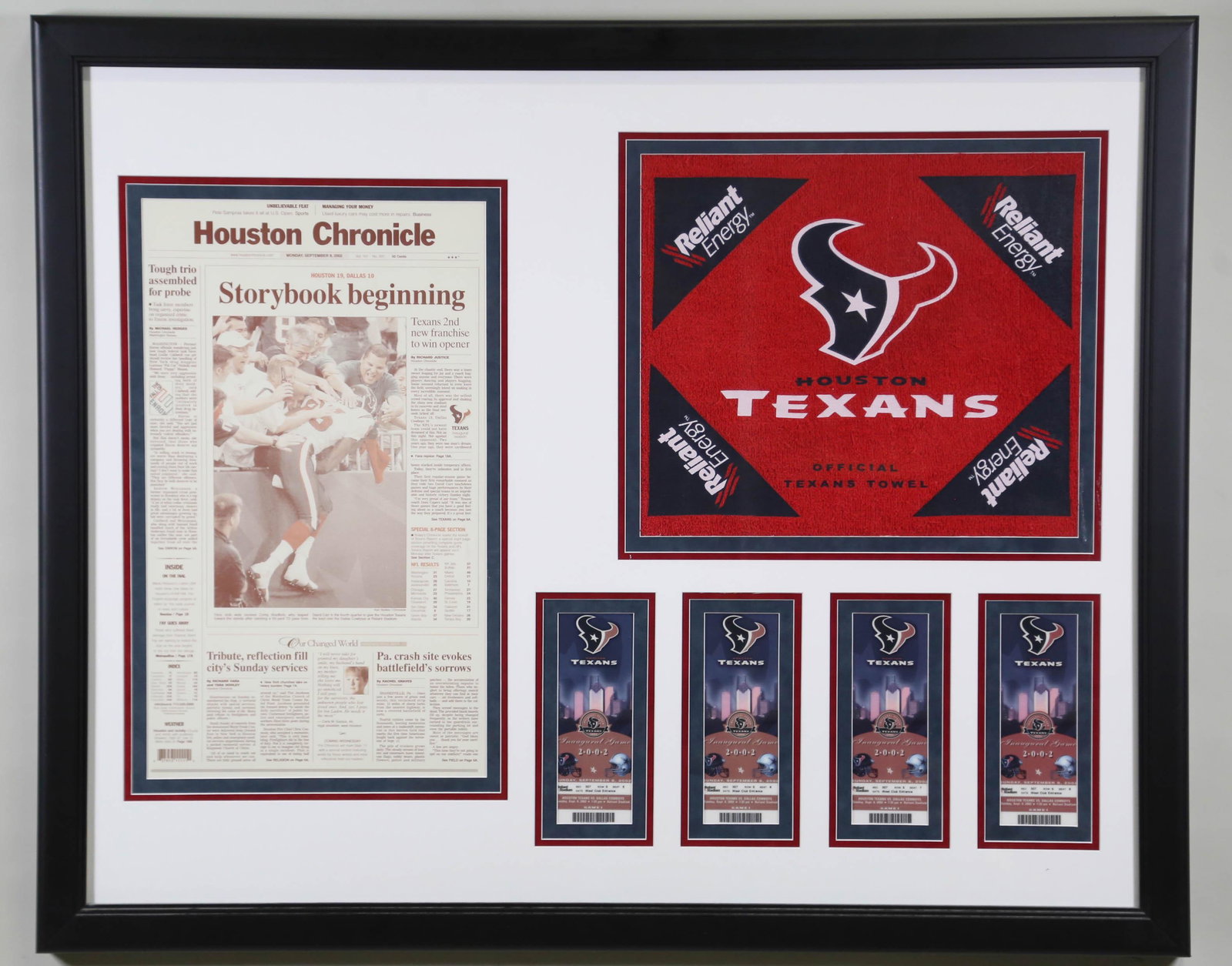 HOUSTON TEXANS 2002 HOUSTON CHRONICLE IN SHADOW BO: HOUSTON TEXANS 2002 HOUSTON CHRONICLE IN SHADOW BOX FRAME. SWEATER, TOWEL AND FOUR TICKETS. Height: 34 by Width: 41
