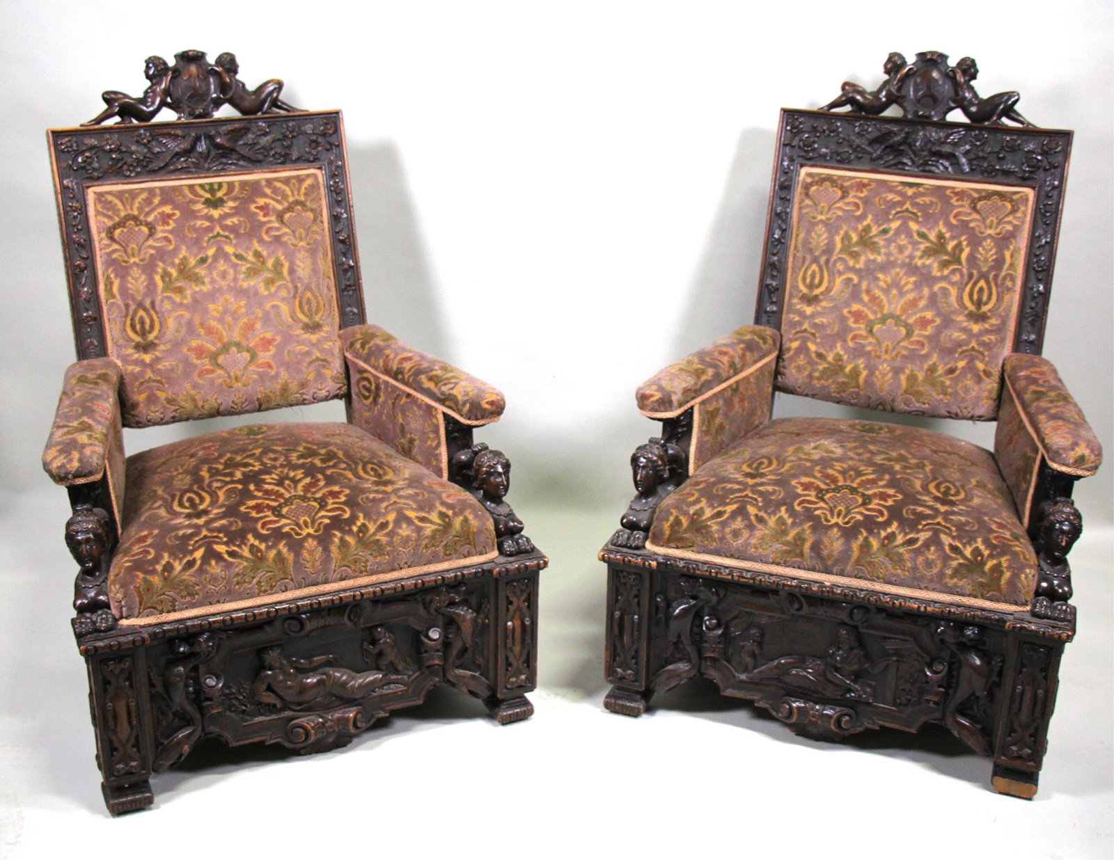 PAIR OF 19th CENTURY RENAISSANCE REVIVAL ARMCHAIRS: PAIR OF 19th CENTURY RENAISSANCE REVIVAL ARMCHAIRS. Height: 44 in. by Width: 31 in. by Depth: 25 in.