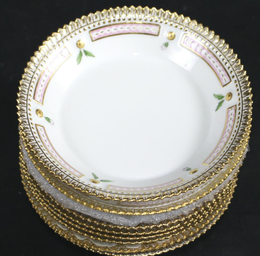 NINE ROYAL COPENHAGEN FLORA DANICA PLATES: SET OF NINE ROYAL COPENHAGEN DENMARK FLORA DANICA SMALL PLATES. Height: 3/4 in. by Width: 5.5 in.