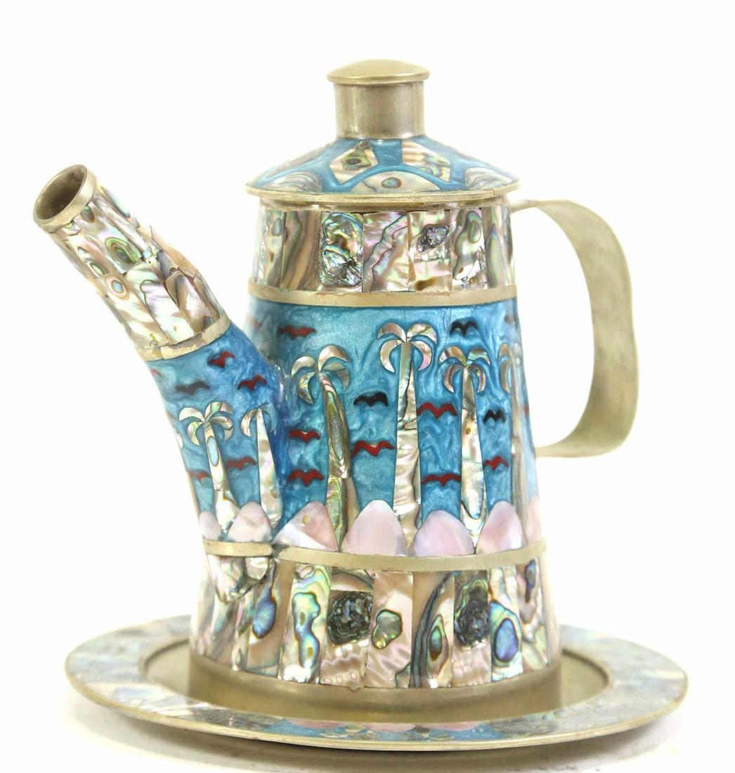 MOTHER-OF-PEARL INLAID TEAPOT AND UNDERPLATE: MOTHER-OF-PEARL INLAID TEAPOT AND UNDERPLATE. Height: 6.5 in. by Width: 7 in. by Depth: 6.5