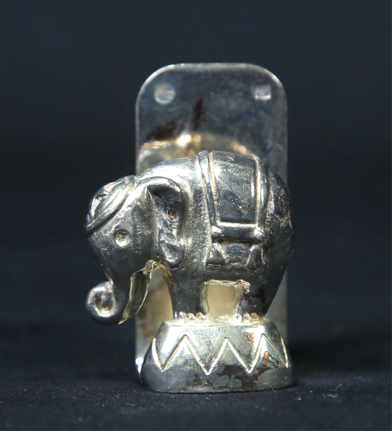 LOT OF 26 SILVER PLATED ELEPHANT NAPKIN HOLDERS: LOT OF 26 SILVER PLATED ELEPHANT NAPKIN HOLDERS. Height: 2 in. by Width: 1 in. by Depth: 1 in.