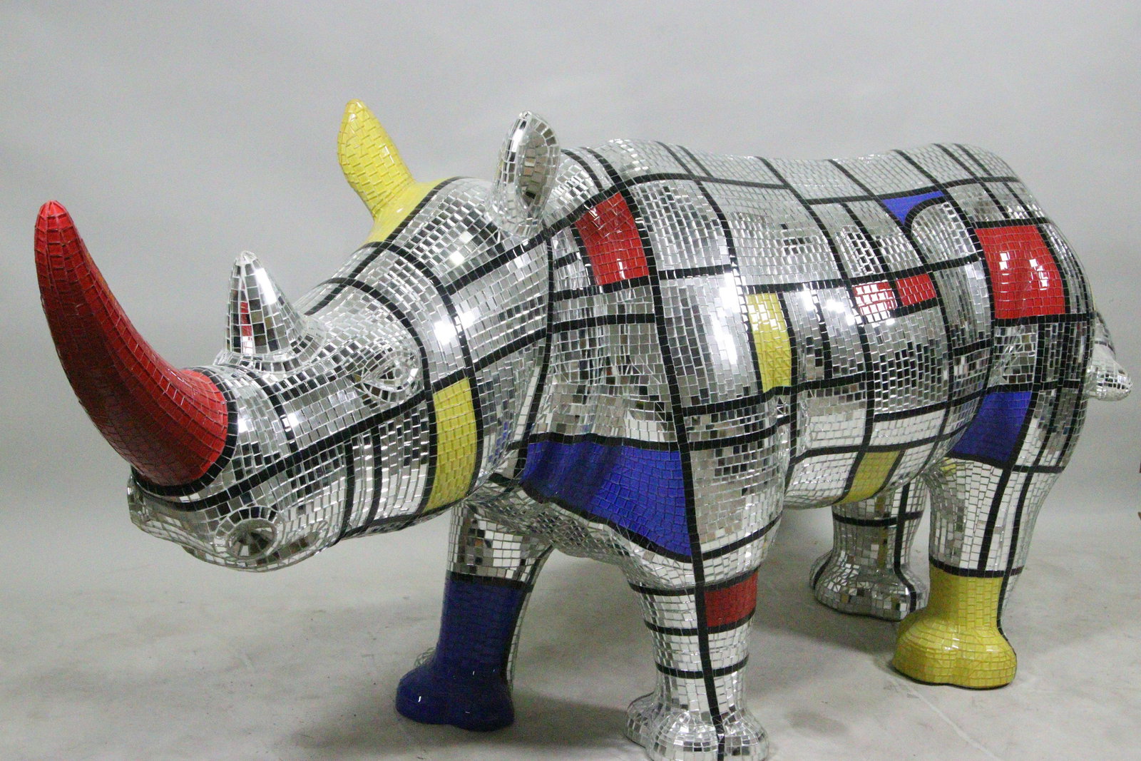 HOMAGE TO LEGER MOSAIC GLASS TILE RHINO: HOMAGE TO LEGER MOSAIC GLASS TILE RHINO. Height: 38 in. by Width: 87 in. by Depth: 22 in.