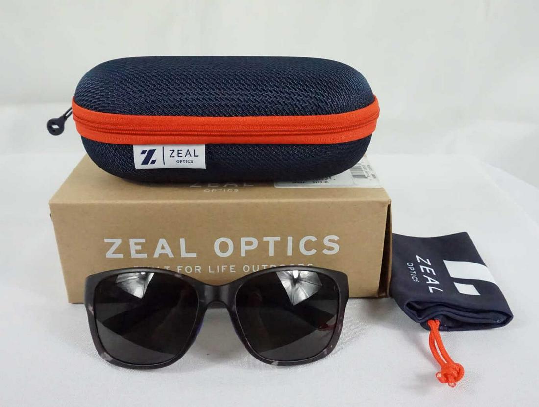 PAIR OF ZAEL OPTICS SUNGLASSES: NEW PAIR OF ZAEL OPTICS SUNGLASSES - FRAME: SMOKE TORTOISE; LENS: DARK GREY; LENS MATERIAL: ELLUME POLARIZED