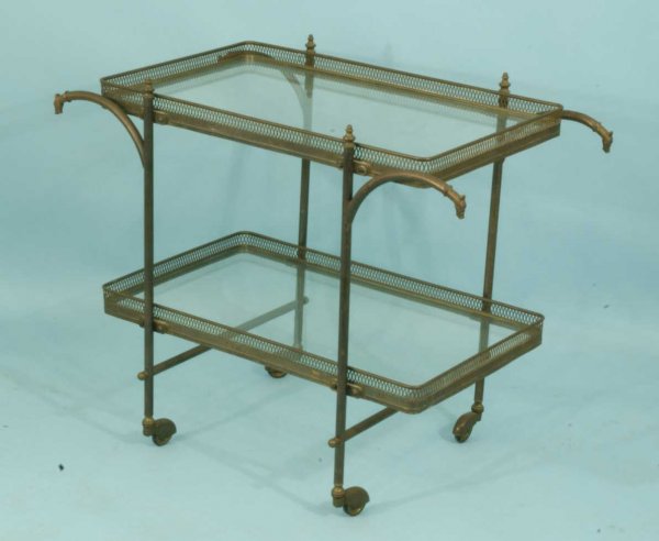 TWO-TIERED TEA CART WITH GLASS SHELVES: TWO-TIERED TEA CART WITH GLASS SHELVES. Height: 27 in. by Width: 32 in. by Depth: 18 in.