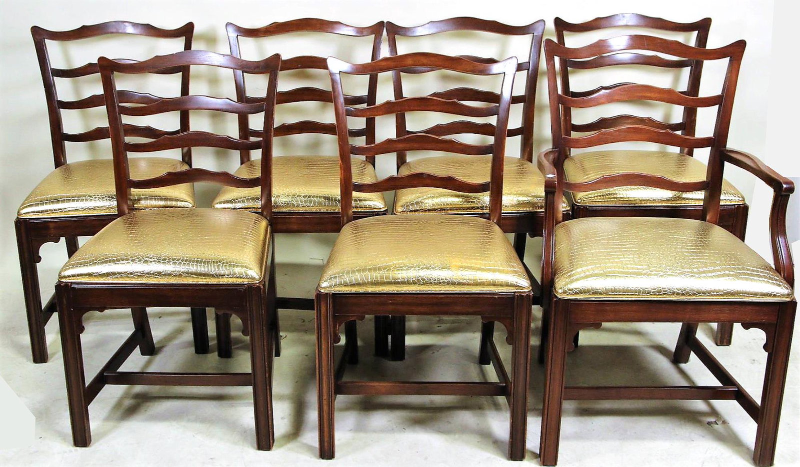 SET OF TEN 1940's CHIPPENDALE STYLE DINING CHAIRS: SET OF TEN 1940's CHIPPENDALE STYLE LADDER BACK DINING CHAIRS. Height: 35 by Width: 19.5 by Depth: 17.5