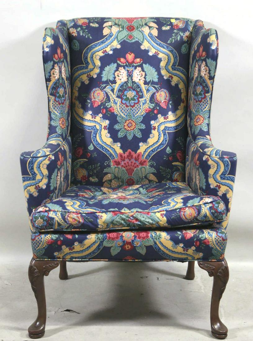 VINTAGE UPHOLSTERED WING CHAIR: VINTAGE UPHOLSTERED WING CHAIR. Height: 42.5 by Width: 29 by Depth: 31
