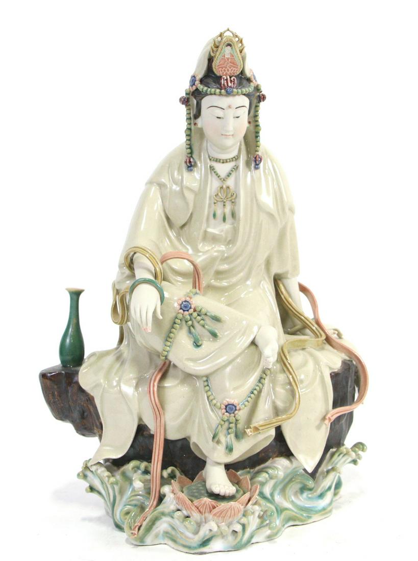 CHINESE PORCELAIN UDDHA FIGURINE (1 of 5)