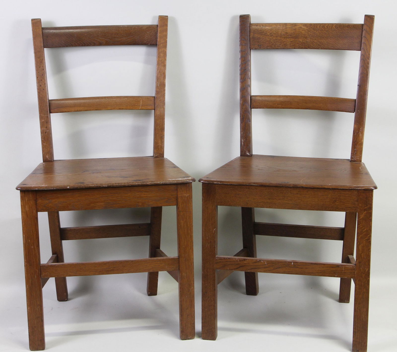 SET OF TWELVE CIRCA 1900 RED OAK LADDERBACK CHAIRS (1 of 1)