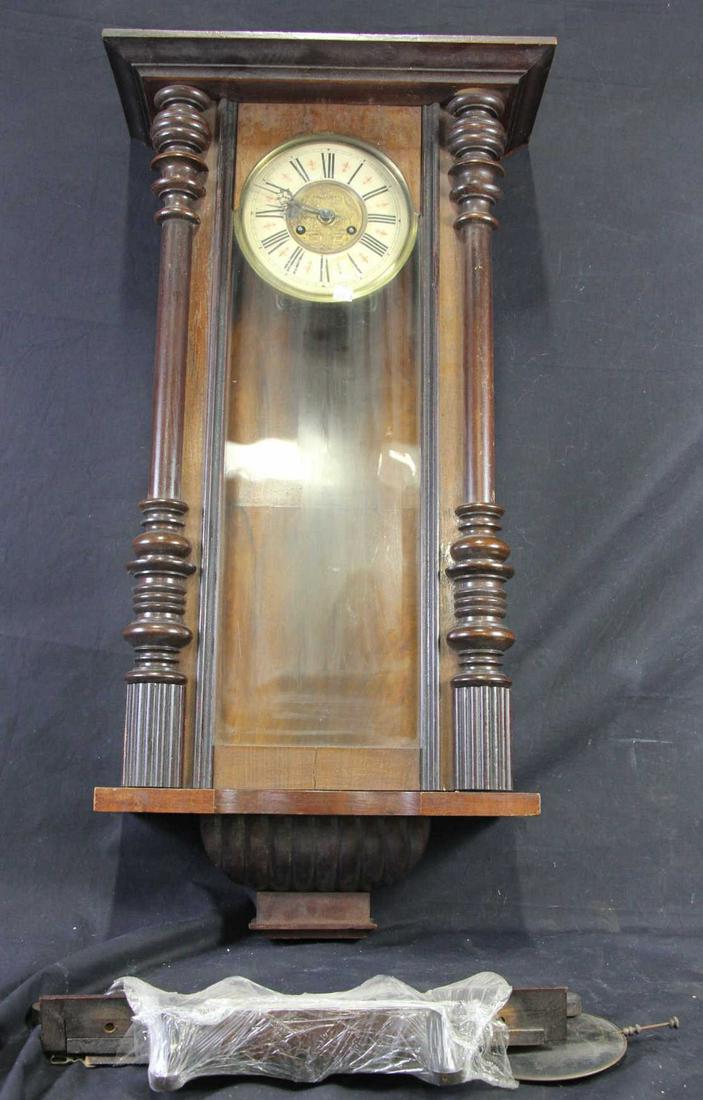 CIRCA 1890's WALL CLOCK: CIRCA 1890's WALL CLOCK. Height: 38 in. by Width: 19 in. by Depth: 8 in.