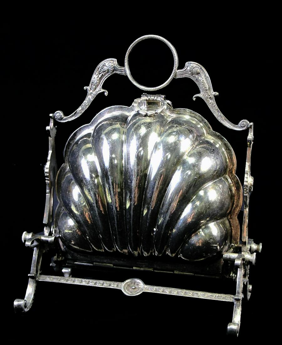 ANTIQUE MUFFIN CADY IN THE FORM OF A SHELL: ANTIQUE 2 PLATED MUFFIN CADY IN THE FORM OF A SHELL Height: 10.5 in. by Width: 6 in. by Depth: 6