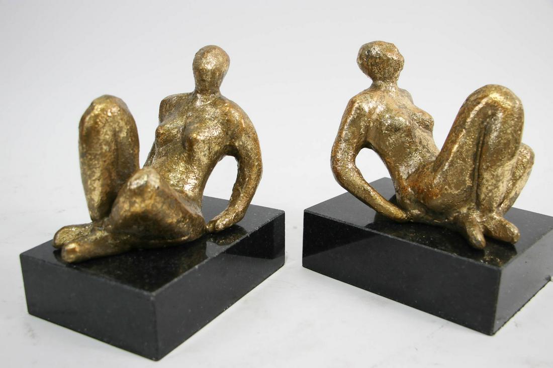 PAIR OF JEANNE RECLINING SCULPTURES ON BASES: PAIR OF JEANNE RECLINING SCULPTURES ON BASES. Height: 6.5 in. by Width: 6.5 in. by Depth: 4.5 in.