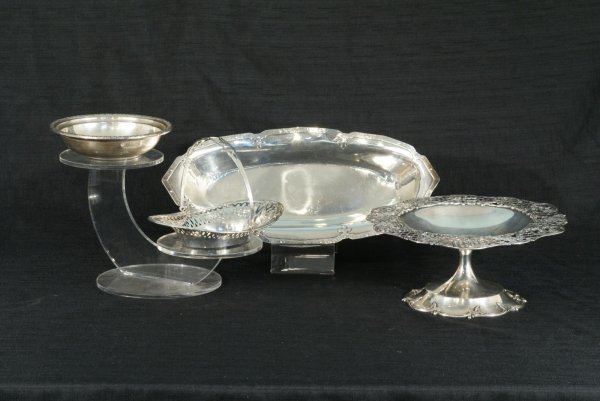 BOX LOT OF STERLING SILVER PIECES: BOX LOT OF STERLING SILVER PIECES. A STERLING SILVER OVAL BREAD TRAY (2 X 13 X 7), "H" ENGRAVED STERLING SILVER BASKET WITH HANDLE(1 1/2 X 7 X 5), AN INTERNATIONAL STERLING SILVER BOWL(1 1/2 X 6), A S