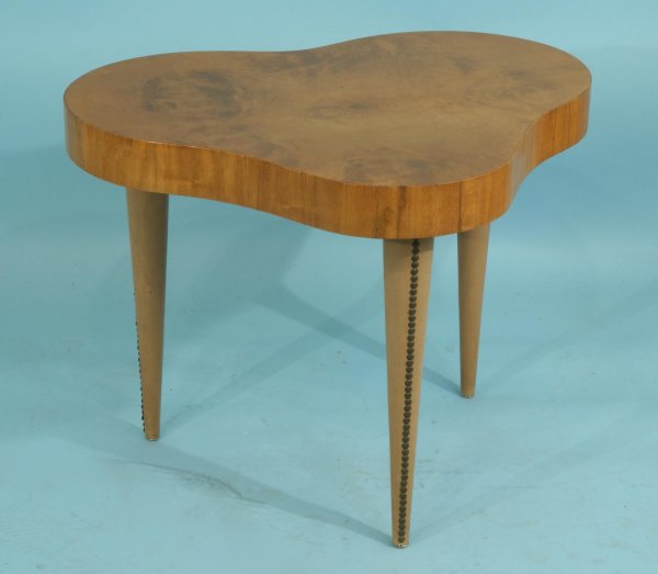 HERMAN MILLER PALDAO END TABLE DESIGNED BY ROHDE: HERMAN MILLER PALDAO END TABLE DESIGNED BY GILBERT ROHDE. CIRCA 1936. PALDAO WOOD, ACACIA BURL, LEATHER, BRASS. BIOMORPHIC TOP ON TAPERED LEATHERETTE WRAPPED LEGS WITH BRASS NAILHEAD DETAILS. Height: