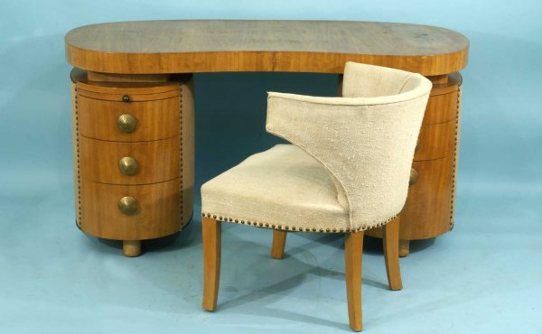 HERMAN MILLER DESK DESIGNED BY GILBERT ROHDE: HERMAN MILLER DESK & CHAIR DESIGNED BY GILBERT ROHDE. CIRCA 1936. 1. DESK HAS LEATHER ON BOTH SIDES. 2.CHAIR IS COVERED IN ORIGINAL RAW SILK UPHOLSTERY. Chair: 28 1/2 by 25 by 24 in. Height: 29 in. by