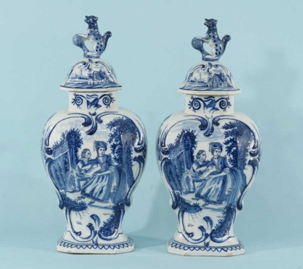 PAIR OF ANTIQUE DELFT GARNITURE VASES, ca. 19th C.: PAIR OF ANTIQUE DELFT BLUE & WHITE GARNITURE VASES W/LIDS. ca. 19th CENTURY. Height: 16 in. by Width: 7 in. by Depth: 5 1/2 in.
