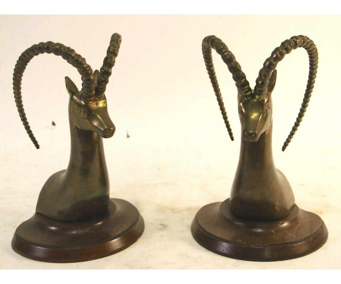 PAIR OF BRASS RAM BOOKENDS: PAIR OF BRASS RAM BOOKENDS. Height: 10.5 in. by Width: 6.5 in. by Depth: 5.5 in.