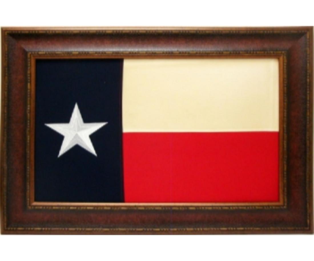 FRAMED STATE OF TEXAS FLAG: FRAMED STATE OF TEXAS FLAG. Height: 31 in. by Width: 36 in.