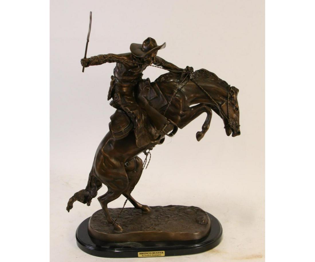 FREDERIC REMINGTON BRONCO BUSTER BRONZE SCULPTURE: FREDERIC REMINGTON BRONCO BUSTER BRONZE SCULPTURE ON MARBLE BASE. Height: 22 in. by Width: 16 in. by Depth: 10 in.