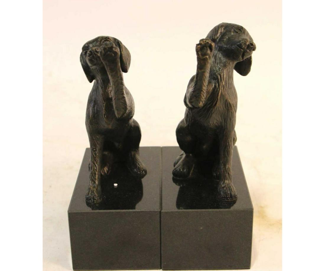 PAIR OF BRONZE DOG BOOKENDS: PAIR OF BRONZE DOG BOOKENDS. Height: 8.25 in. by Width: 3 in. by Depth: 5 in.