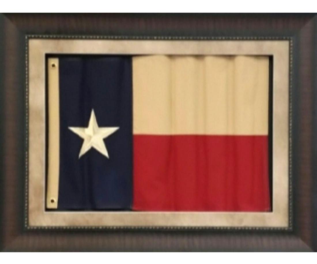 FRAMED WAVY STATE OF TEXAS FLAG: FRAMED WAVY STATE OF TEXAS FLAG. Height: 39 in. by Width: 49 in.
